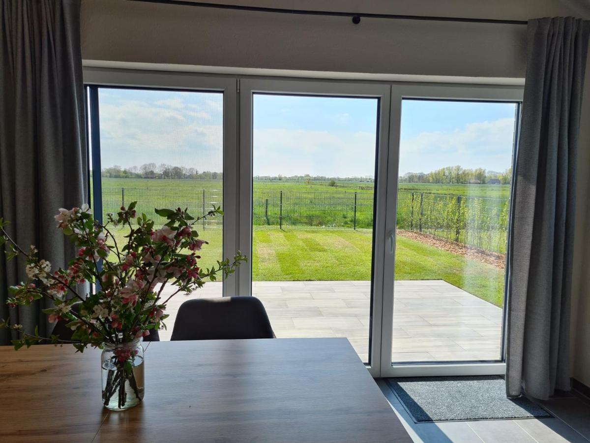 Watt'N Blick - Hundefreundliches Ferienhaus Mit Ausblick Ueber Die Wiesen Bis Zum Deich Schweiburg Exterior photo